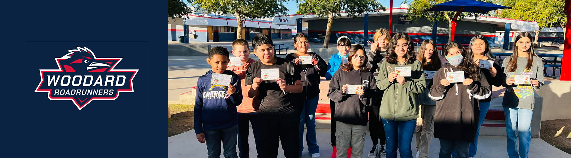 Woodard Roadrunners - group of students outside holding certificates